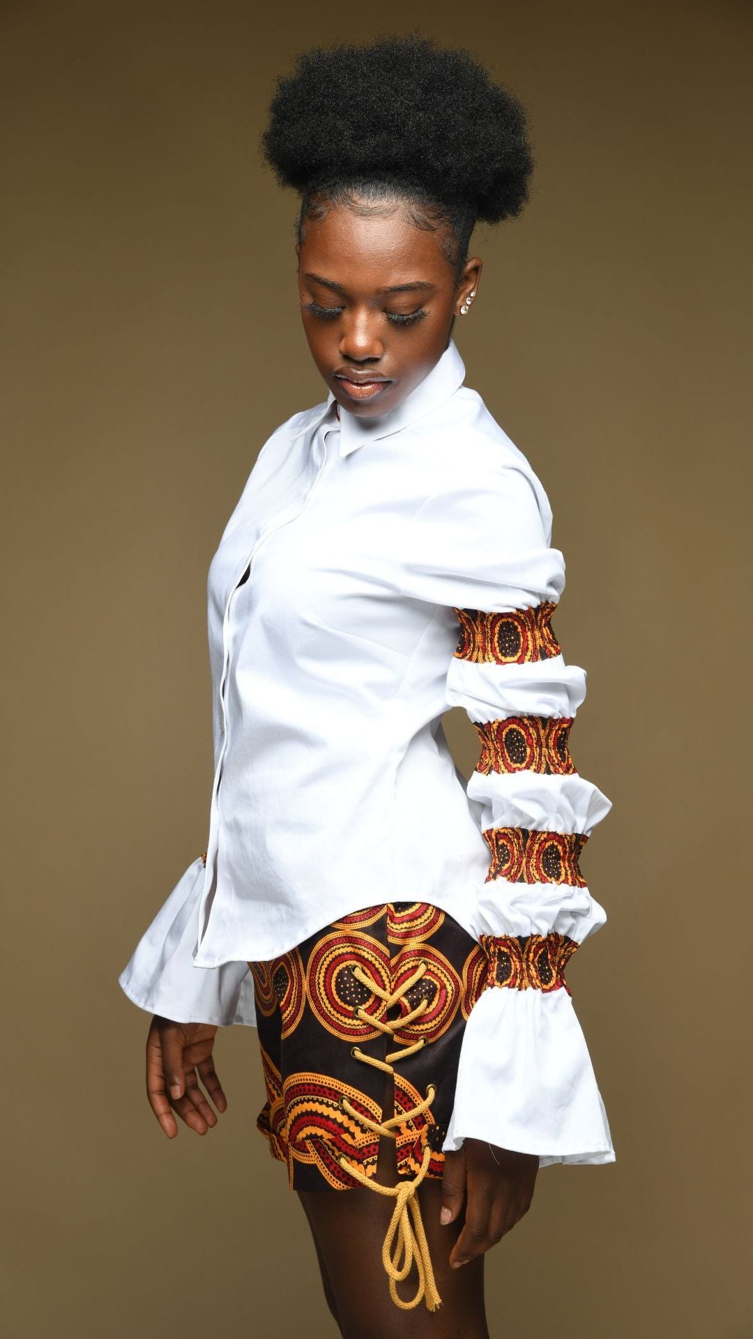 INFINITY White shirt with Coco Brown Ankara Trim Puff Sleeves.