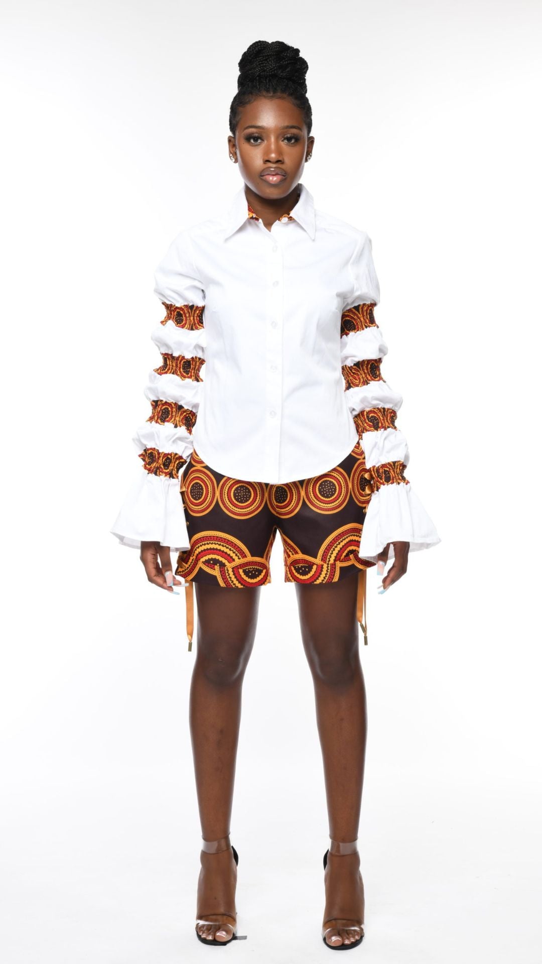 INFINITY White shirt with Coco Brown Ankara Trim Puff Sleeves.